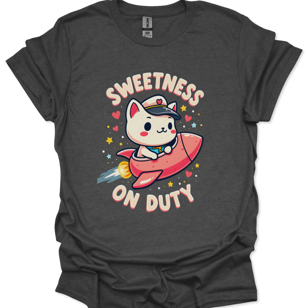 Dark gray t-shirt with a cartoon cat on a rocket and 'Sweetness on Duty' text.
