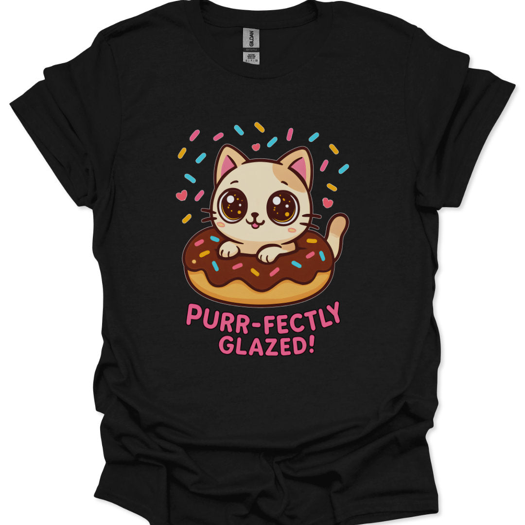 Black t-shirt with a cat on a donut graphic and 'Purr-fectly Glazed!' text.
