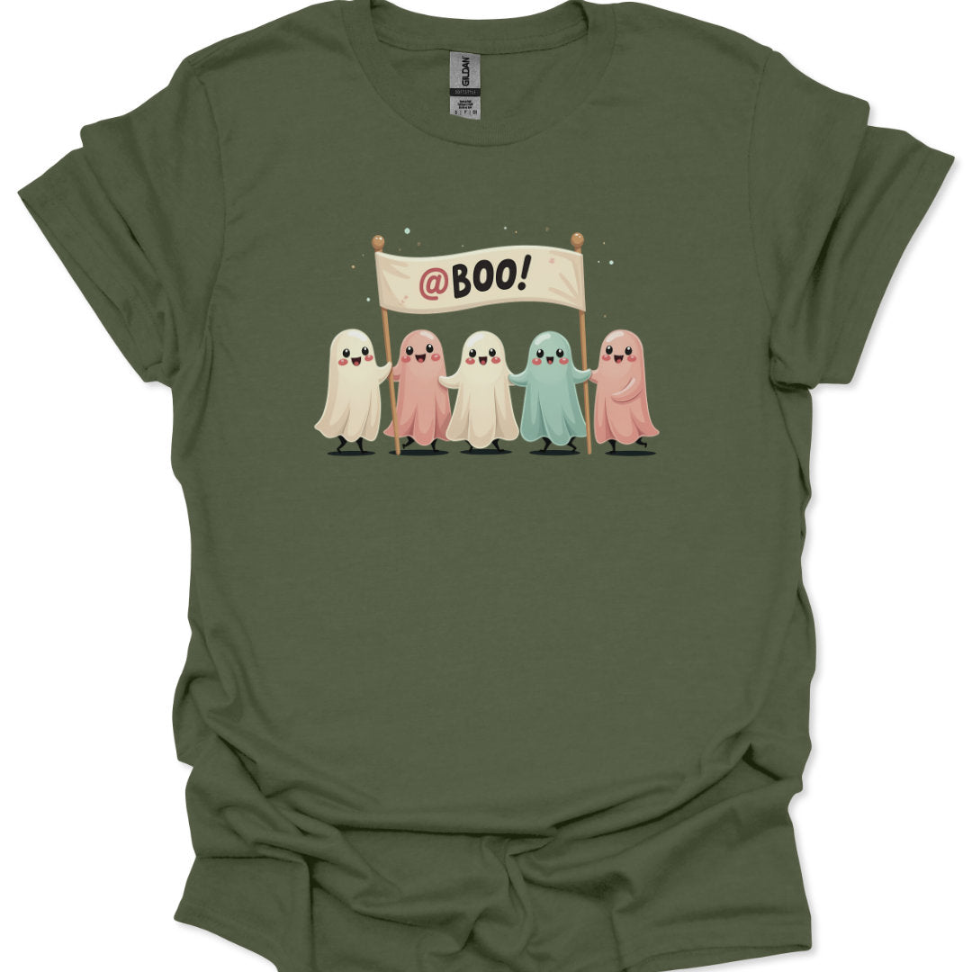 Green t-shirt with cartoon ghosts holding a 'BOO!' banner on a white background