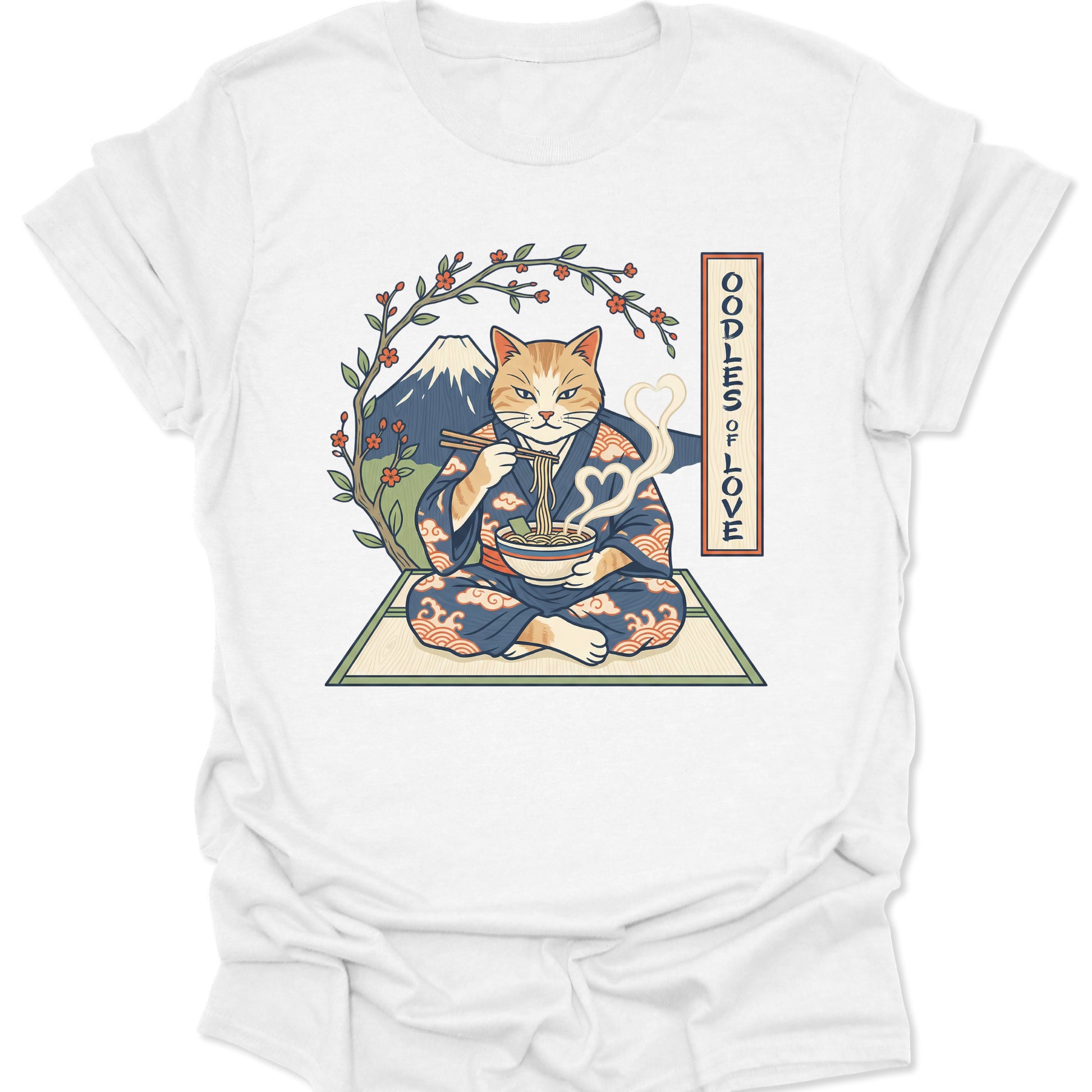White unisex adult t-shirt featuring an orange cat in a kimono eating ramen with heart-shaped steam and Mt Fuji background.