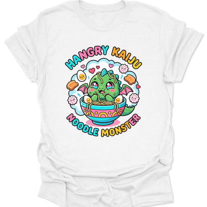 White unisex adult t-shirt featuring a kawaii chibi dragon slurping noodles in a colorful bowl with eggs and fish cakes.