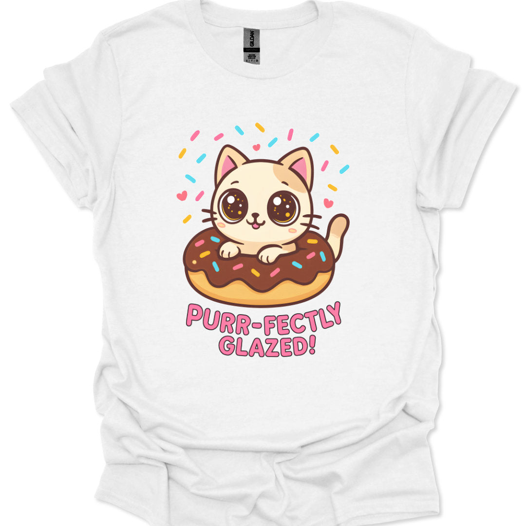 White t-shirt with a cat on a donut graphic and 'Purr-fectly Glazed!' text.