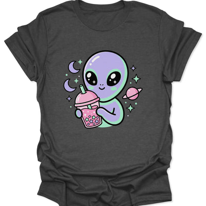 Dark heather unisex adult t-shirt with a cute pastel alien sipping star-filled bubble tea in a galaxy setting.