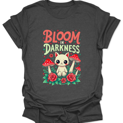 Dark heather grey cotton shirt featuring a bloom in darkness cat and botanical art piece in a gothic aesthetic, isolated on a white background.