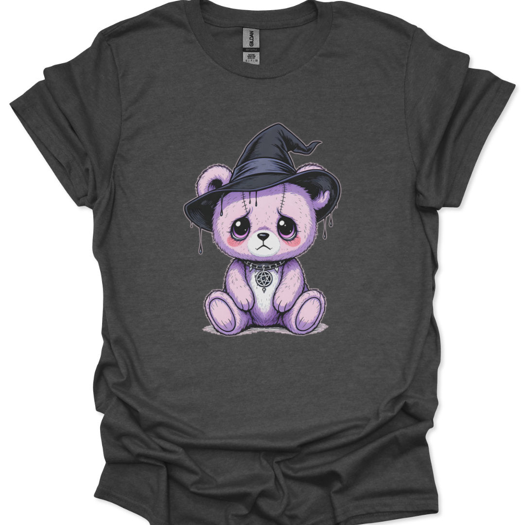 Gray t-shirt with a purple teddy bear wearing a witch hat design on a white background