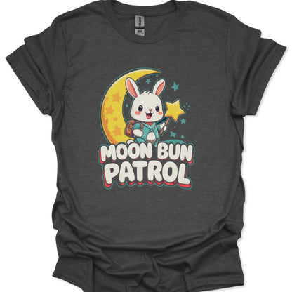 Dark gray t-shirt with a cartoon bunny on a moon and stars design and 'Moon Bun Patrol' text.