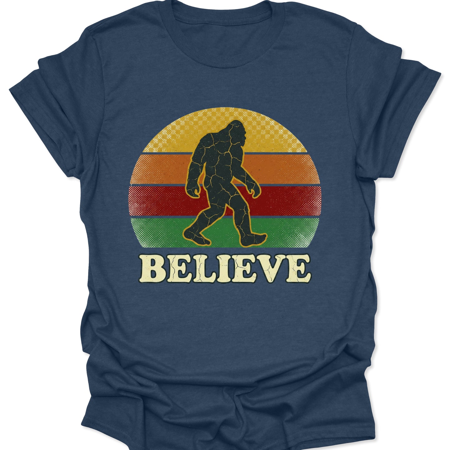 Heather navy unisex adult t-shirt featuring a distressed Bigfoot silhouette walking across a retro striped sunset.