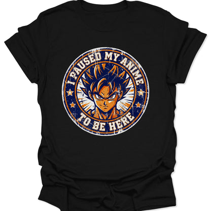 Black unisex adult t-shirt featuring a distressed orange and blue vintage anime hero graphic with funny pause quote.