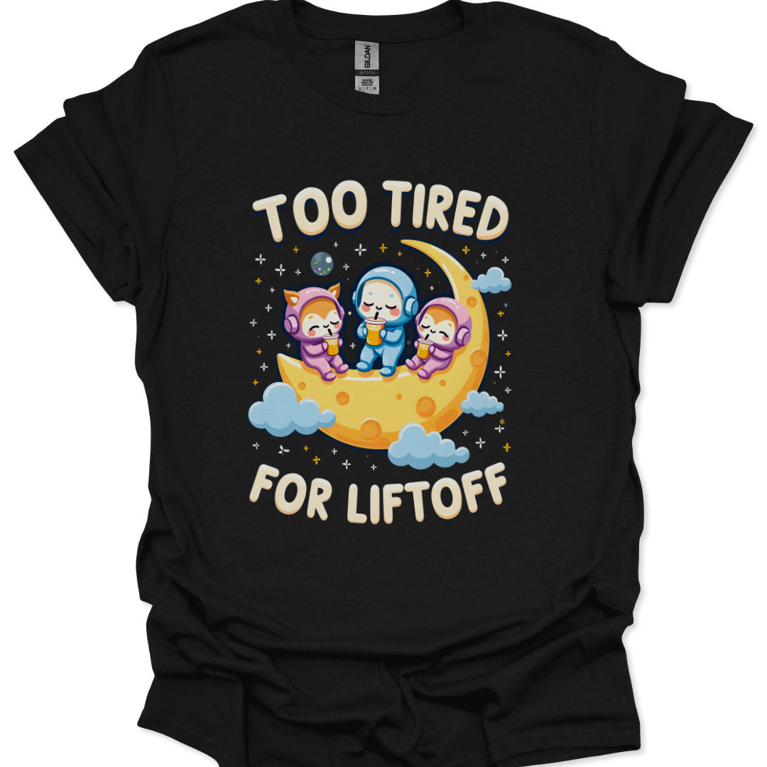 Black t-shirt with cartoon characters on a moon and 'Too Tired for Liftoff' text.