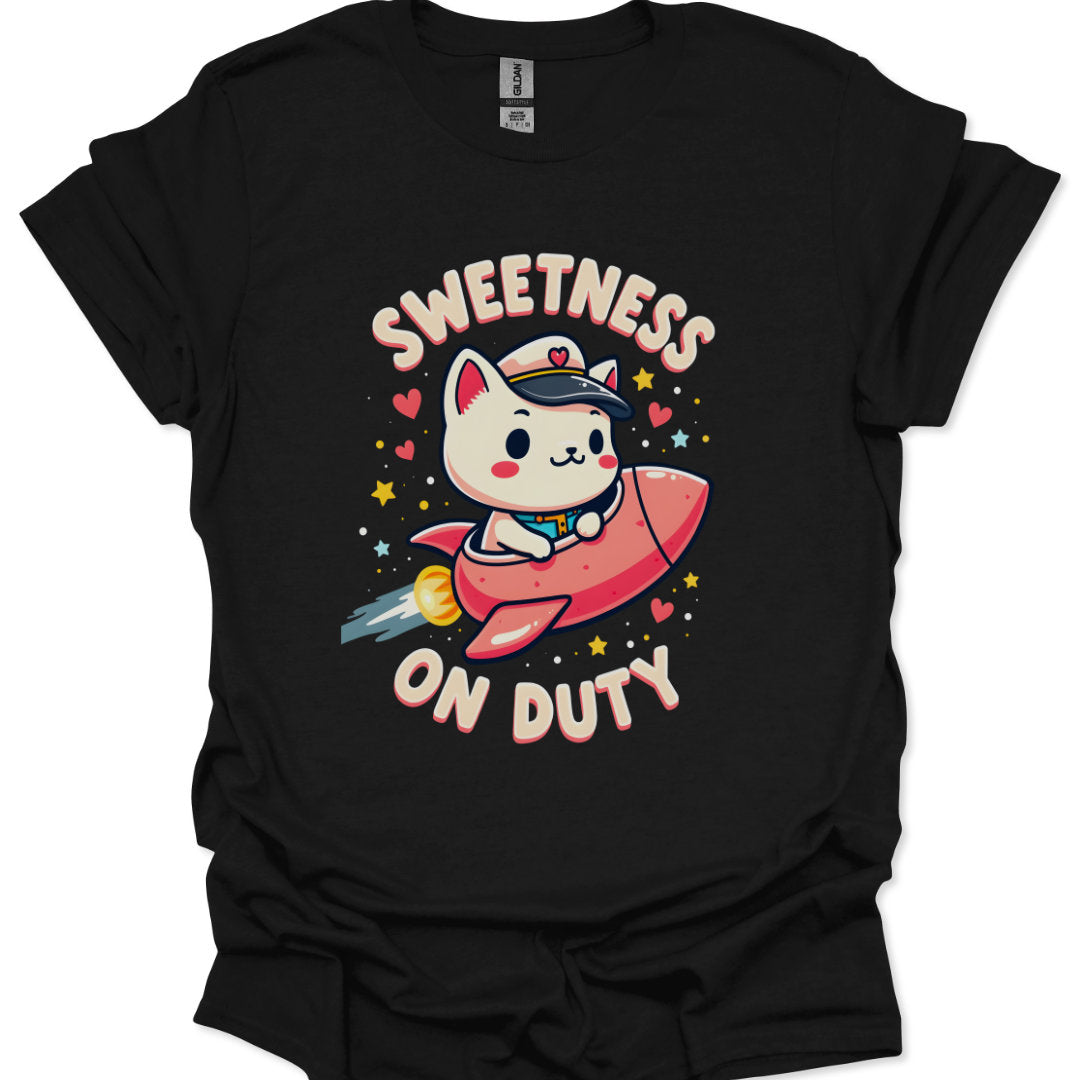 Black t-shirt with a cartoon cat in a rocket ship and 'Sweetness on Duty' text.