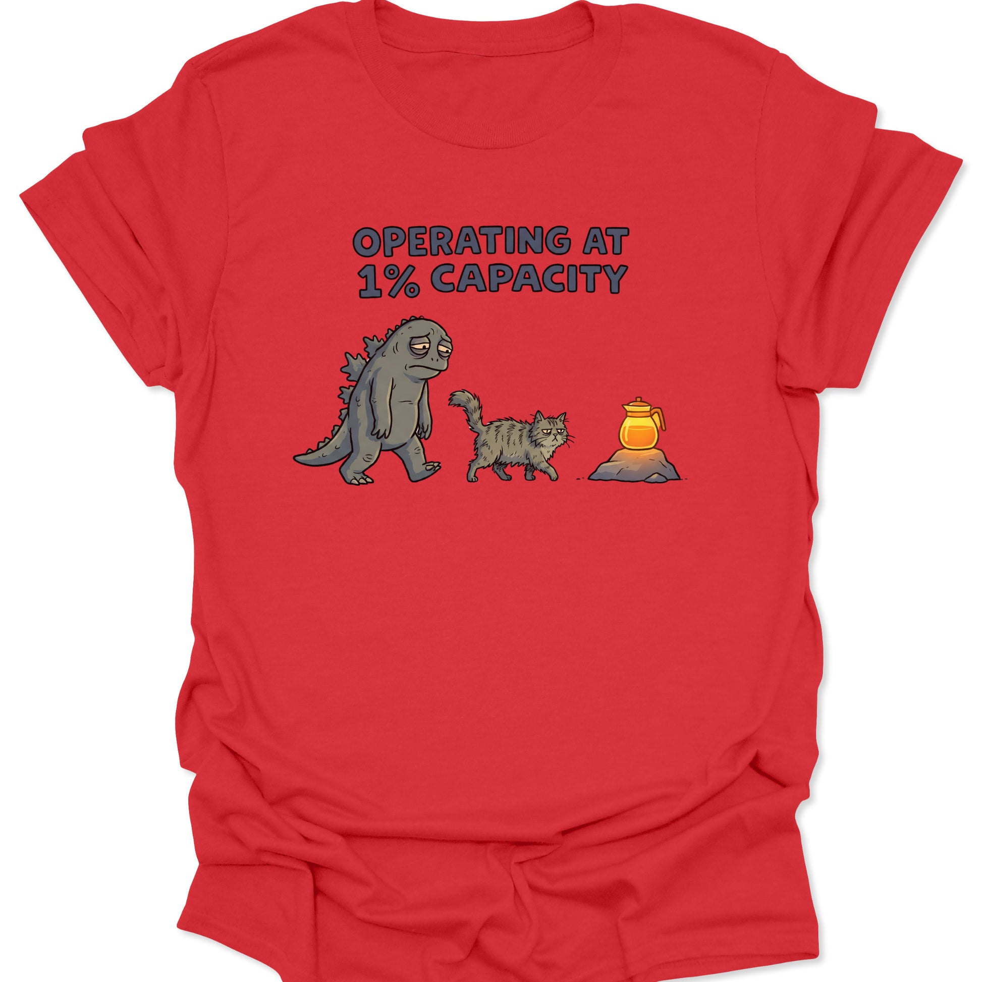 Red graphic tee with relatable low energy Godzilla and cat design operating at 1% capacity text for coffee lovers.