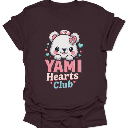 Dark Chocolate ring-spun cotton shirt featuring a Yami Kawaii nurse bear with medical heart icons in a chibi anime style, isolated on a neutral studio background.