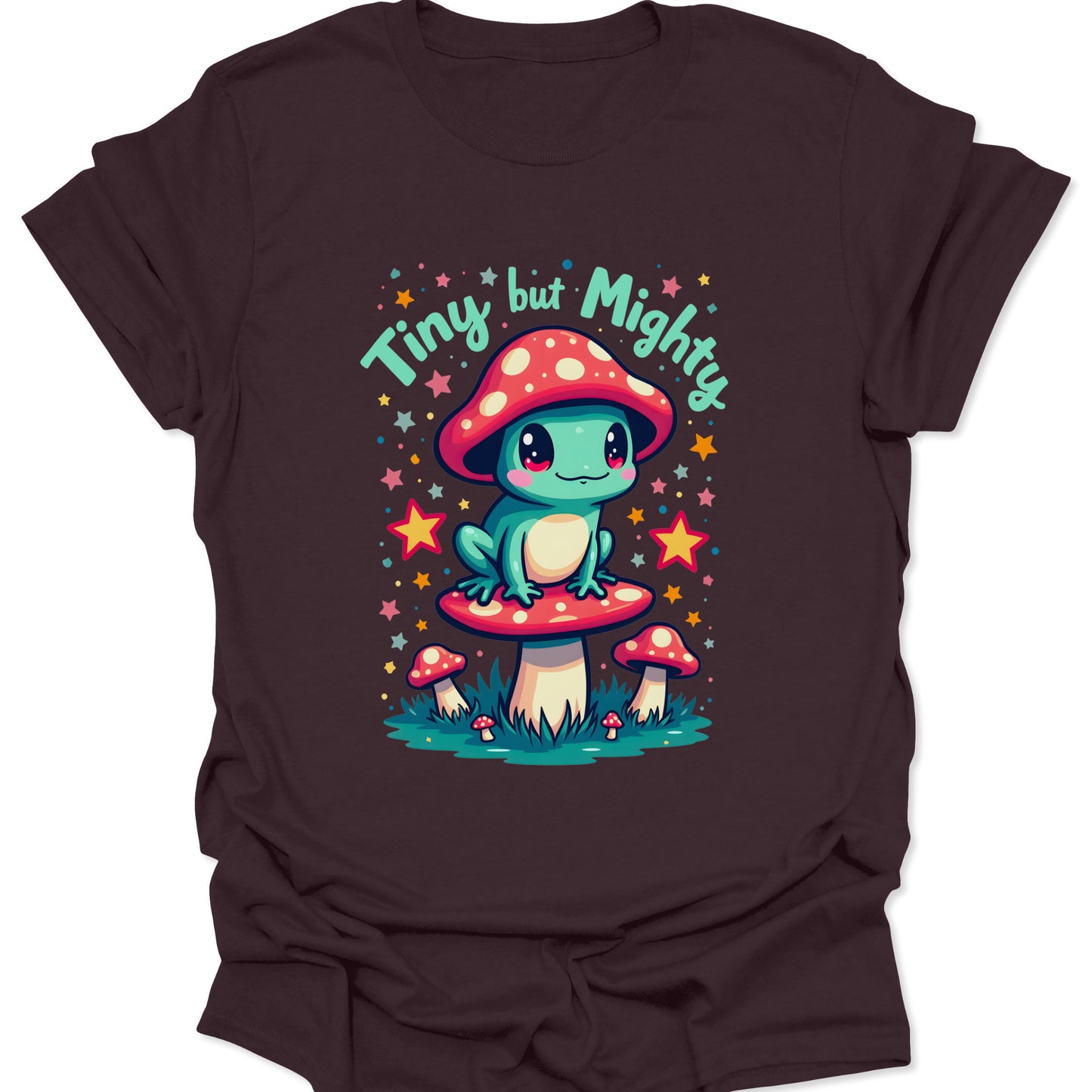 Dark Chocolate brown cotton shirt featuring a teal frog perched on a red-capped mushroom in a forest-core illustration style, isolated on a deep brown background.
