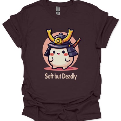 Brown t-shirt with a cartoon character in a samurai helmet and 'Soft but Deadly' text on a white background