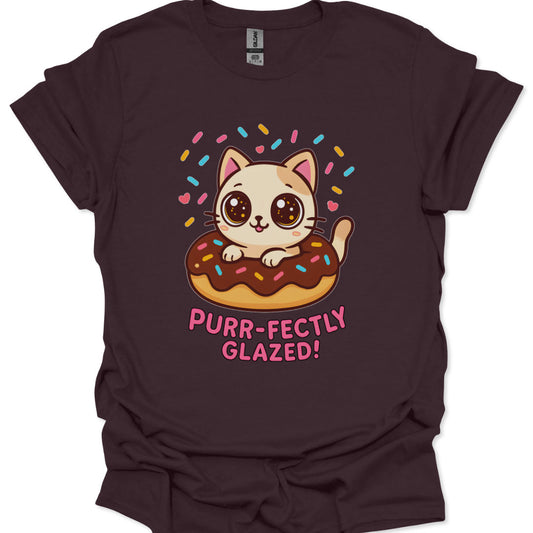 Maroon t-shirt with a cat on a donut graphic and 'Purr-fectly Glazed!' text.