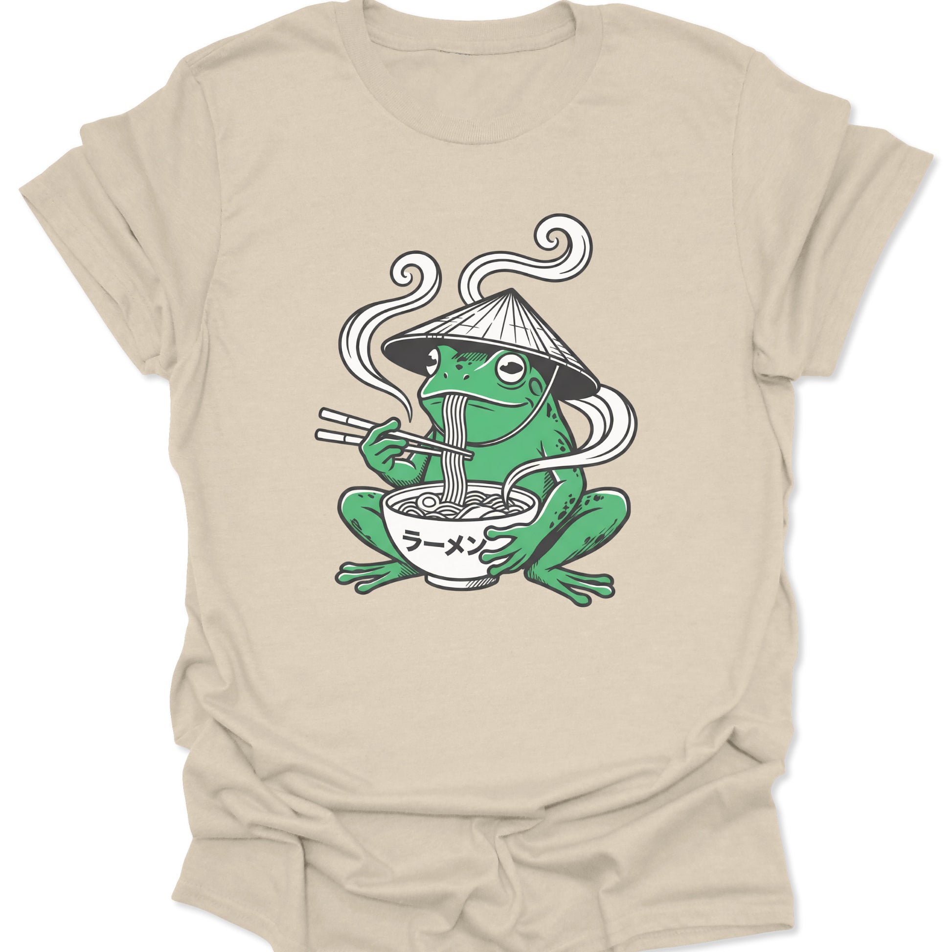 Natural unisex adult t-shirt featuring an aesthetic cottagecore frog in a conical hat enjoying a bowl of steaming ramen.