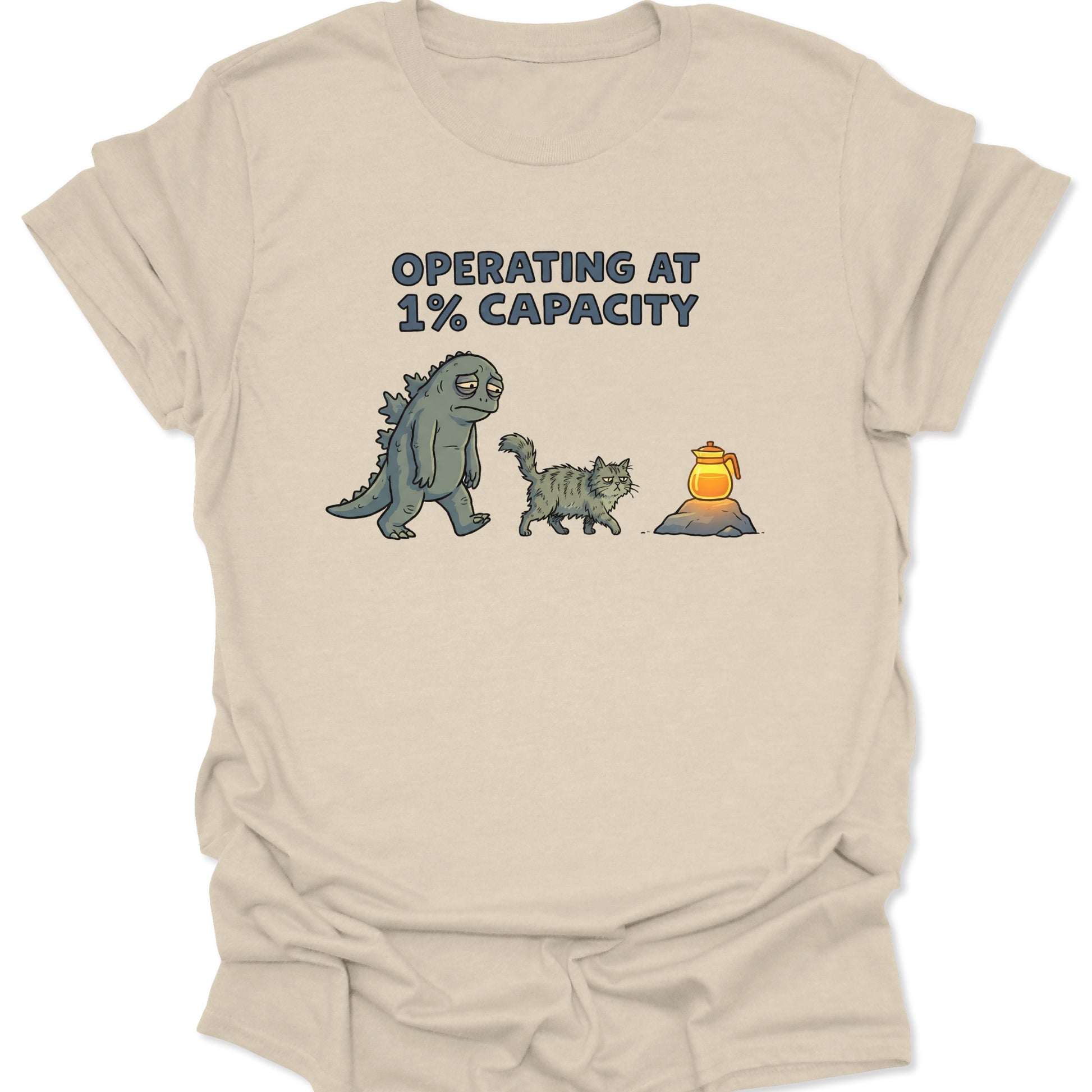 Natural unisex adult t-shirt featuring tired Godzilla and fluffy cat walking toward coffee pot text operating at 1% capacity.