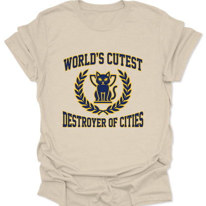 Natural cream unisex adult t-shirt displaying a retro harajuku style chibi cat city destroyer design in navy and gold.