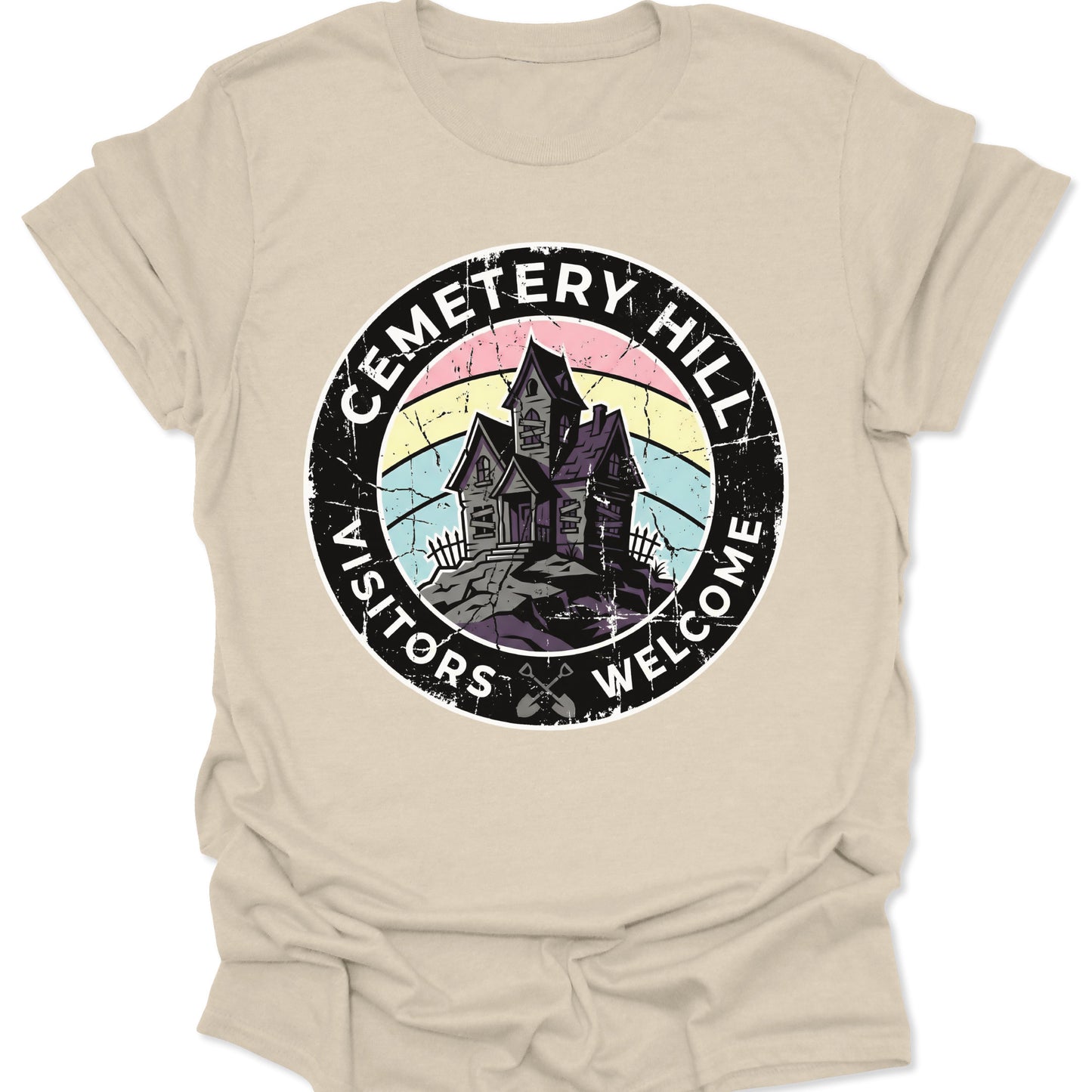 Natural unisex adult t-shirt displaying a vintage horror graphic with crossed shovels and Cemetery Hill typography.