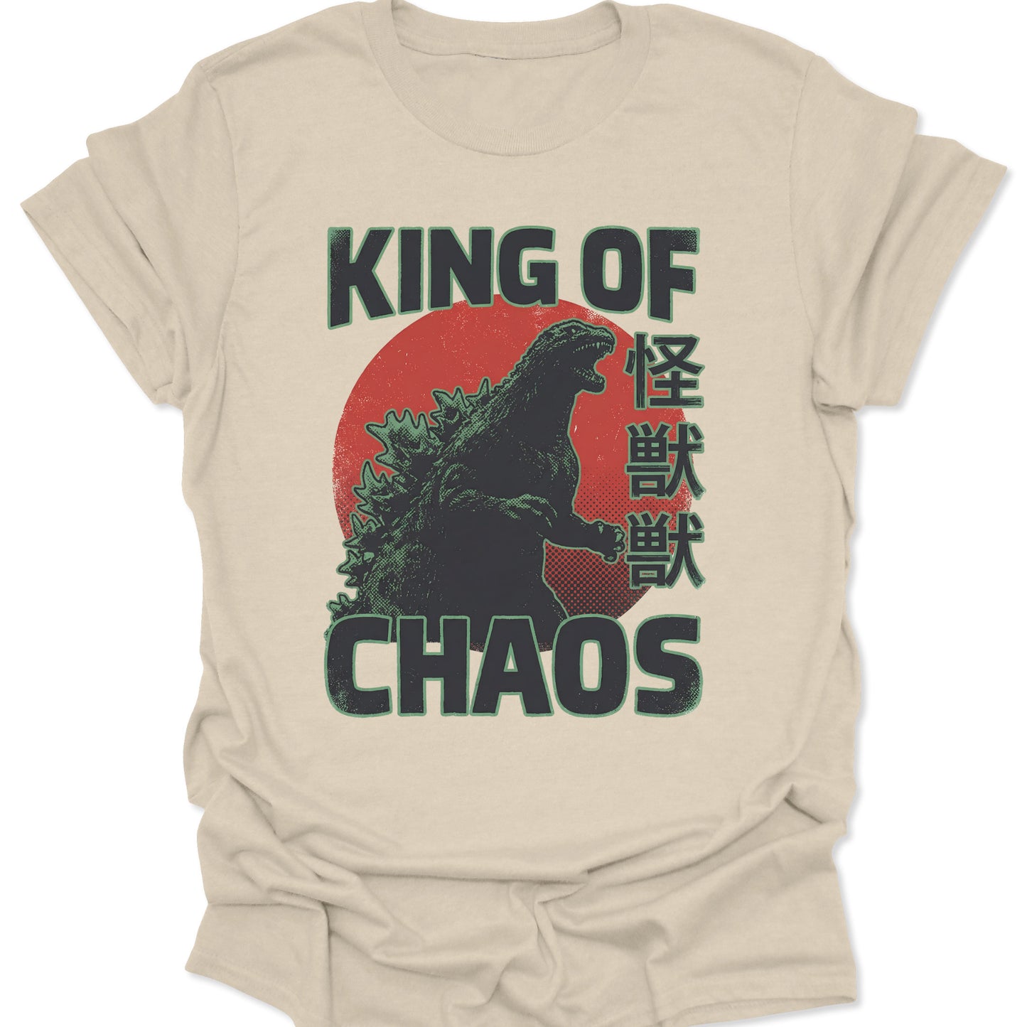 Cream natural-colored shirt with a retro Japanese Kaiju graphic, red circle sun, and King of Chaos distressed lettering.