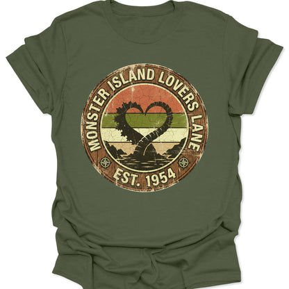 Military Green unisex adult t-shirt featuring lovers lane monster tail heart graphic in retro sunset colors.