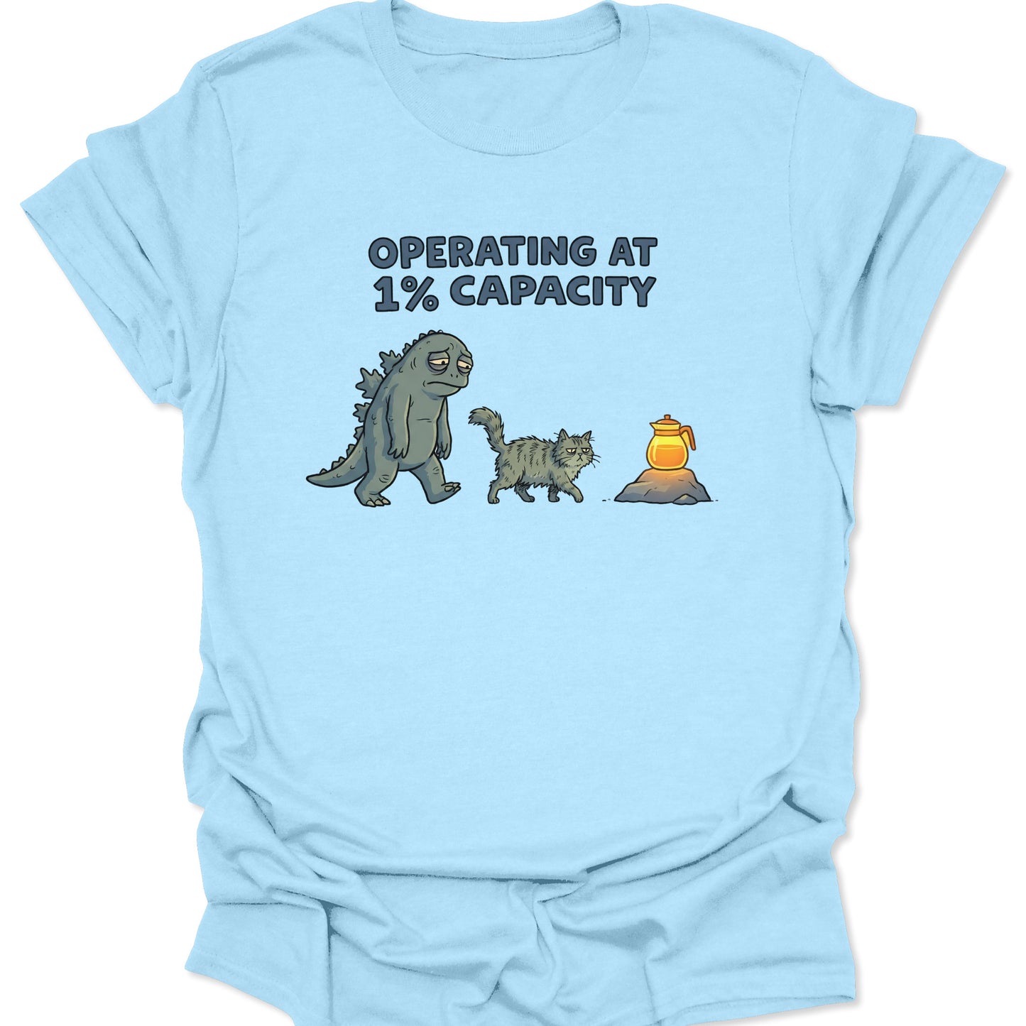 Light Blue t-shirt featuring retro cartoon art of fatigued kaiju and kitty needing coffee funny Monday vibe.