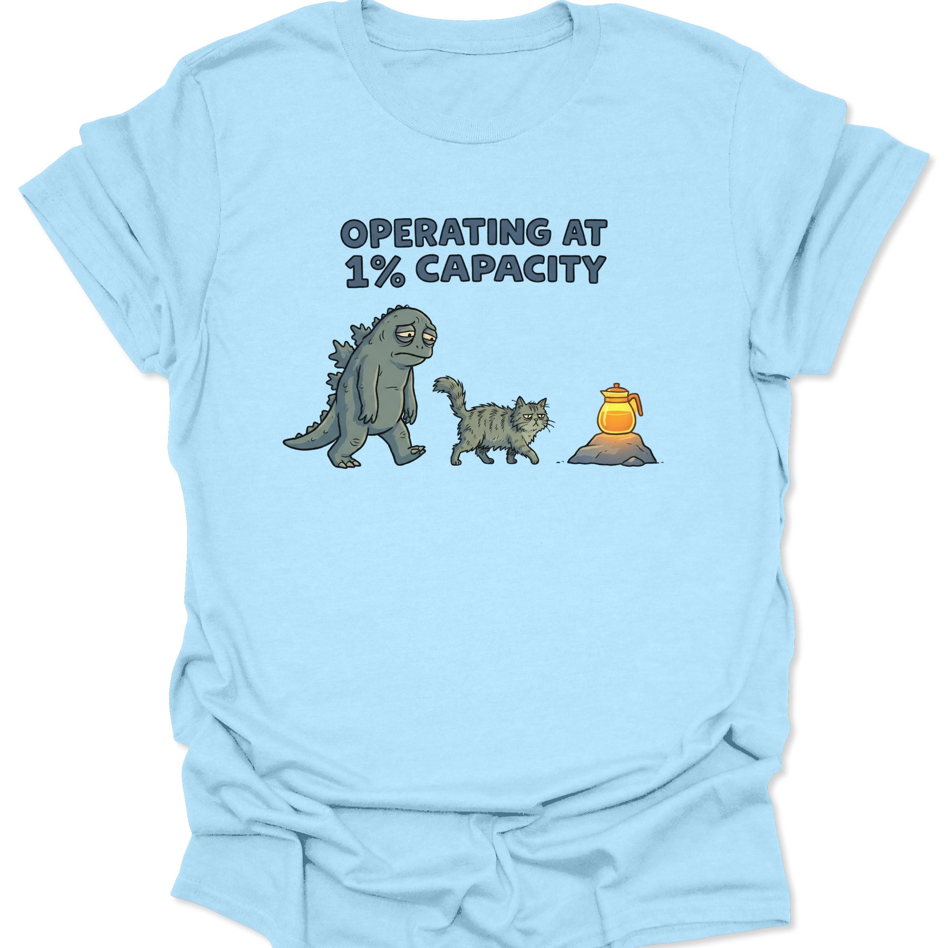 Light Blue t-shirt featuring retro cartoon art of fatigued kaiju and kitty needing coffee funny Monday vibe.