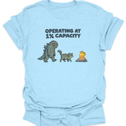 Light Blue t-shirt featuring retro cartoon art of fatigued kaiju and kitty needing coffee funny Monday vibe.