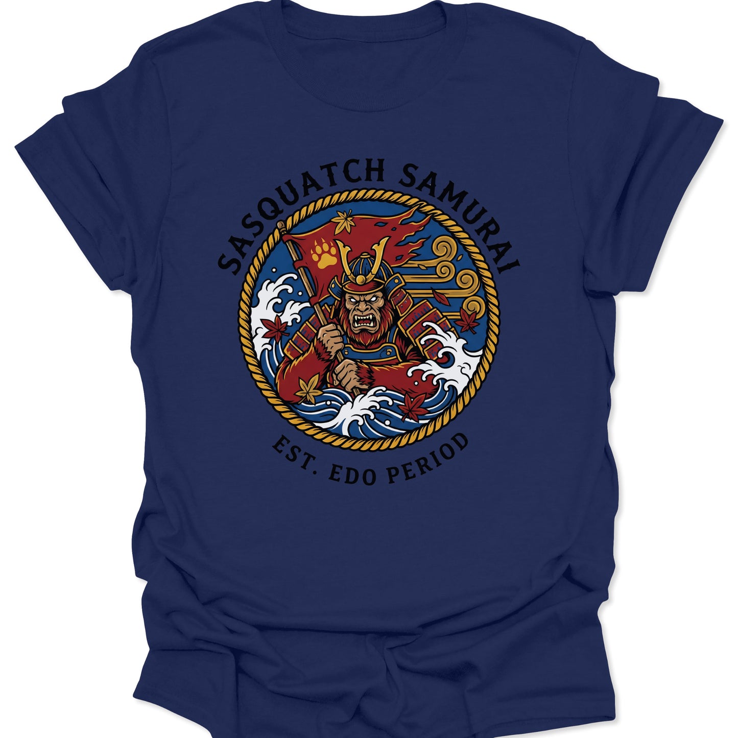 Navy unisex adult t-shirt with a bold Sasquatch Samurai graphic, crashing waves, and red maple leaves in Irezumi style.
