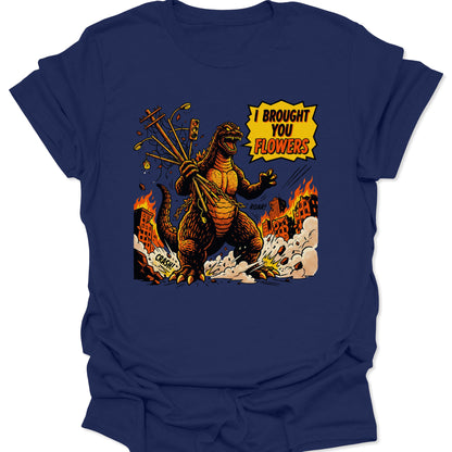 Navy unisex adult t-shirt with a bright orange graphic of a monster holding traffic lights like flowers saying I Brought You Flowers.