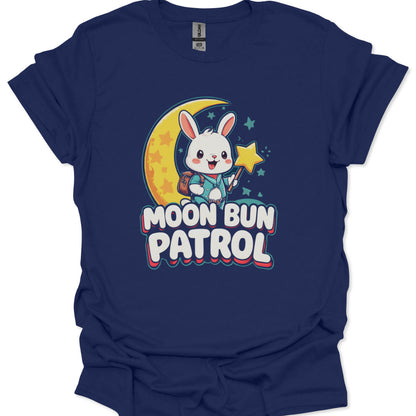 Navy blue t-shirt with a cartoon bunny on a moon and stars design and 'Moon Bun Patrol' text.