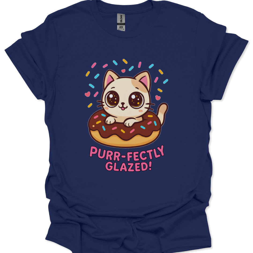 Navy blue t-shirt with a cat on a donut graphic and text 'Purr-fectly Glazed!' on a white background