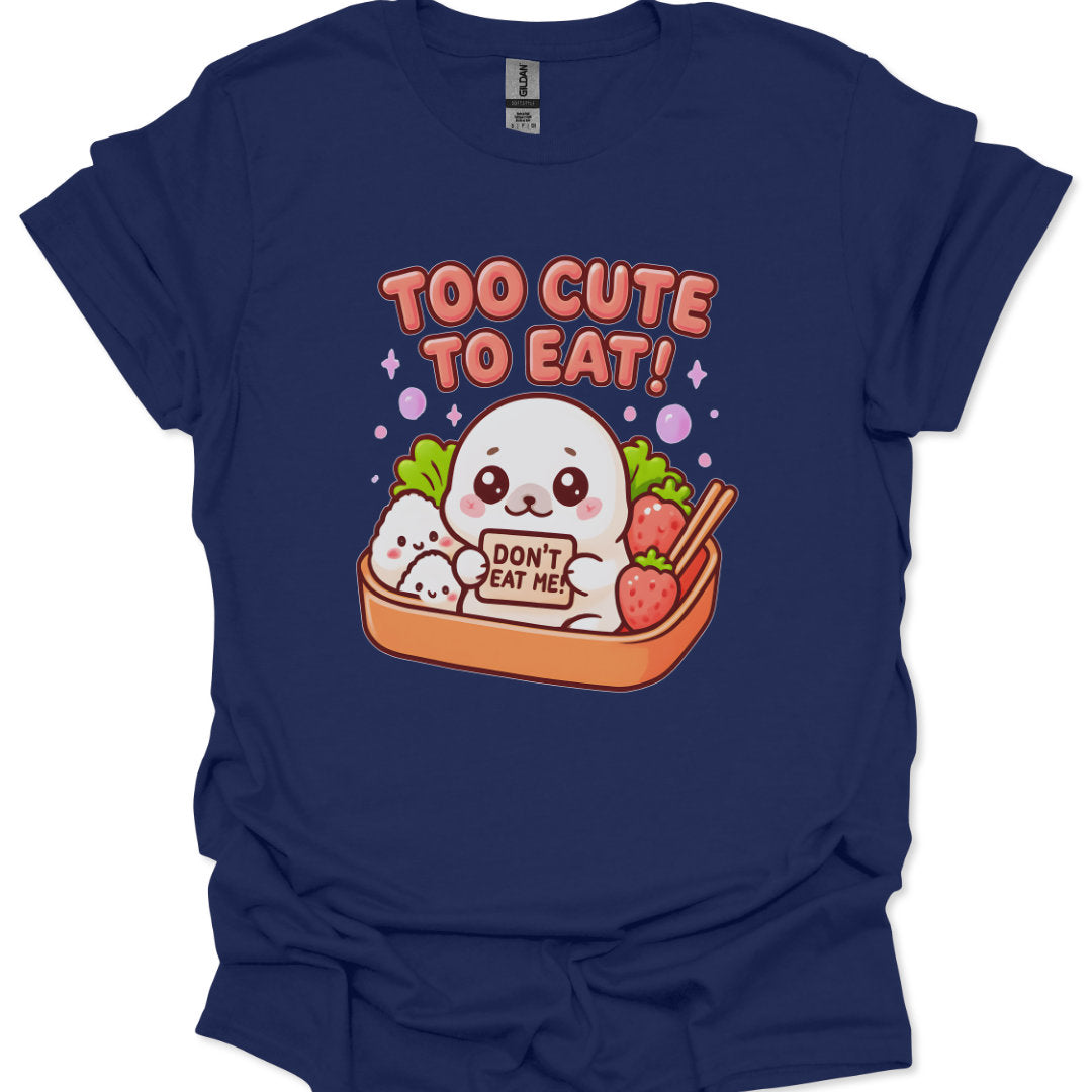 Navy blue t-shirt with a cartoon character and text 'Too Cute to Eat!' on a white background