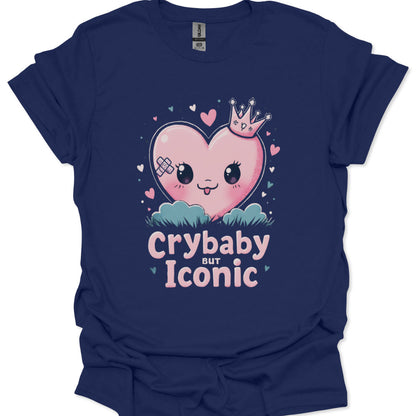 Navy blue t-shirt with a pink heart graphic and 'Crybaby but Iconic' text on a white background