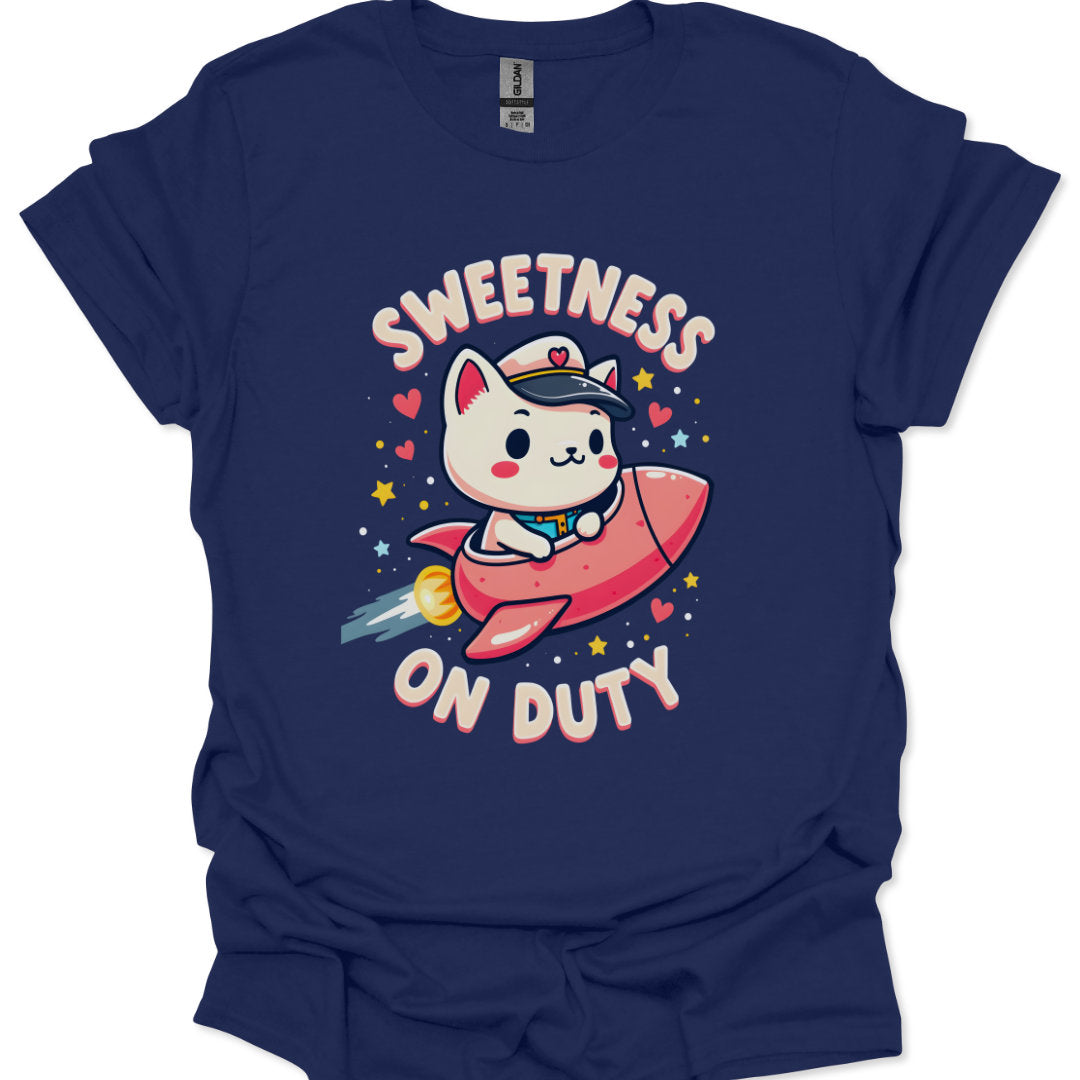 Navy blue t-shirt with a cartoon cat on a rocket and 'Sweetness on Duty' text.